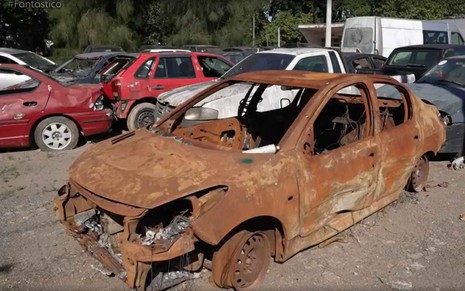 Imagem de carro queimado em tentativa de golpe da seguradora