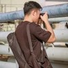 Imagem de jovem tirando foto em ensaio fotográfico